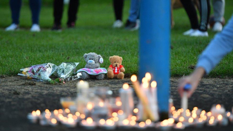 candles lit at vigil