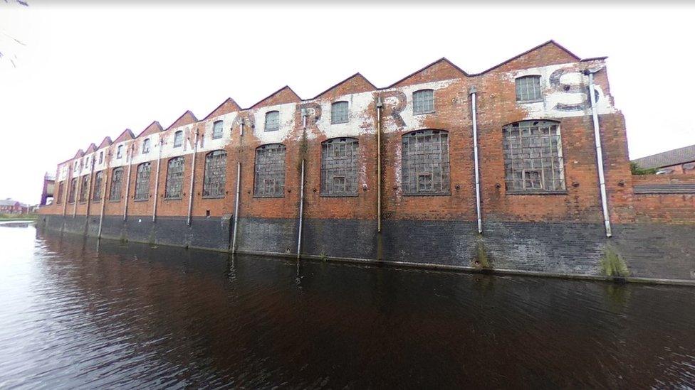 A canal-side view of the former Herbert Morris factory