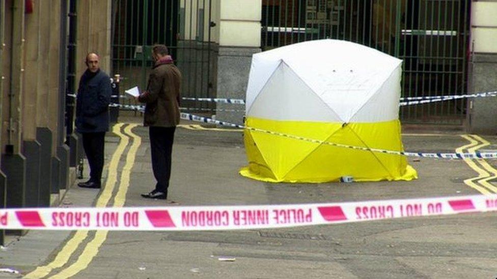 Police at the scene of the killing