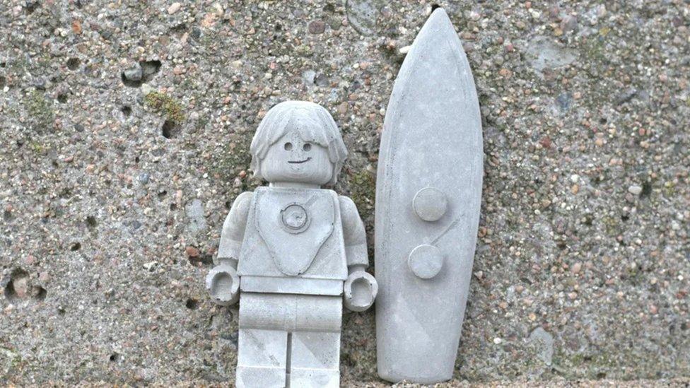 Surfer lego concrete