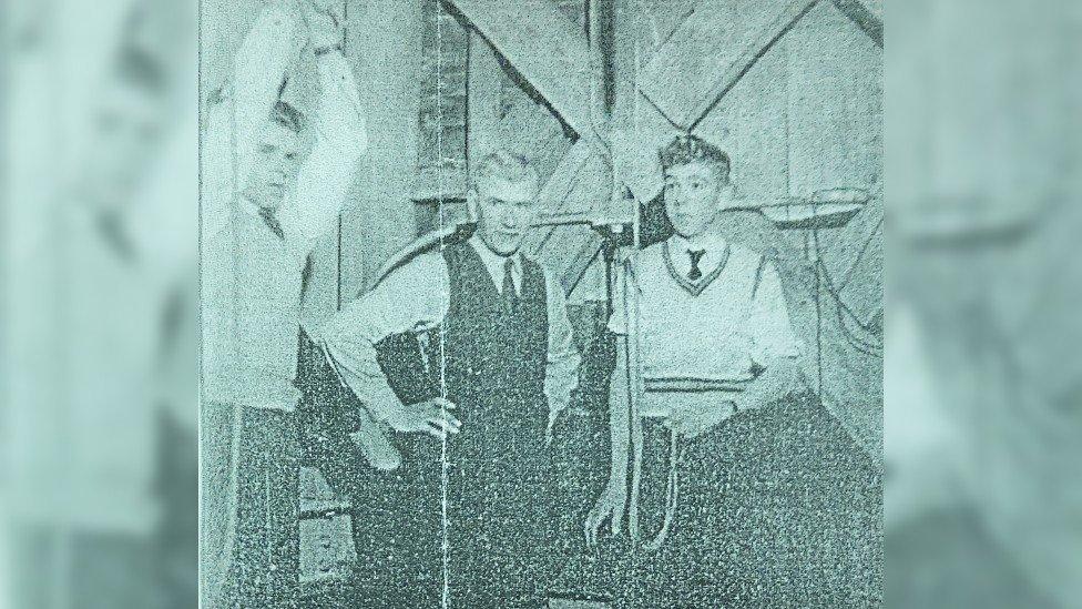 Robin Pittman and two other men ringing bells