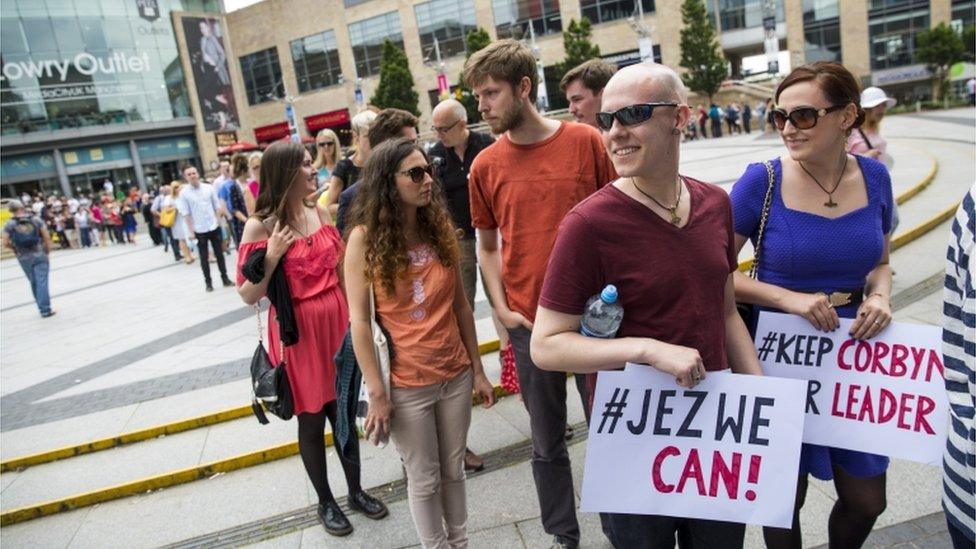 Corbyn supporters queue for a rally supporting the Labour leader in Manchester