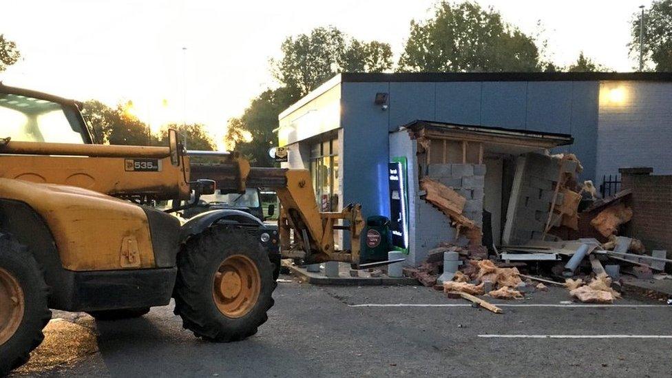 Scene after cash machine was ripped from wall