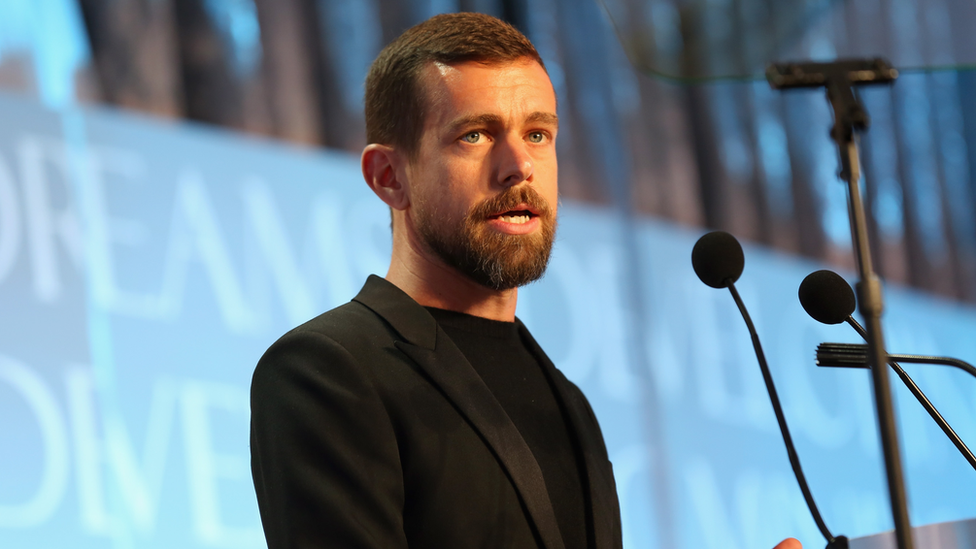 Man standing in front of microphone