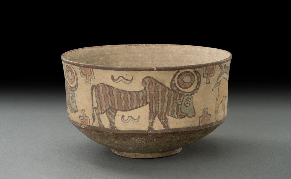 A terracotta pot with a bull and other animals on it, 3500–2800 BC