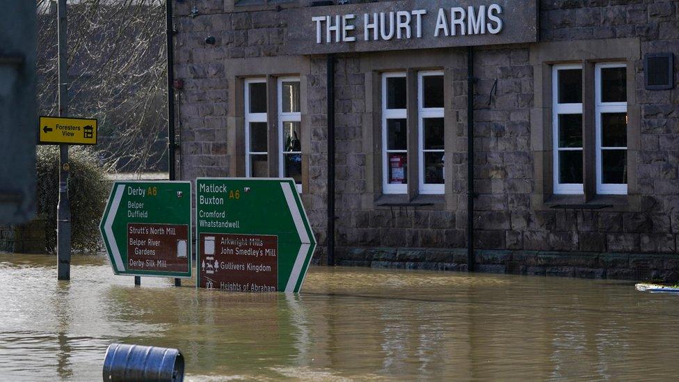 The Hurt Arms pub is surrounded by flood water in Belper, Derbyshire