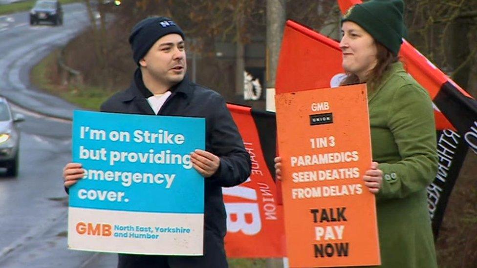 Ambulance staff on strike in Hexham with signs