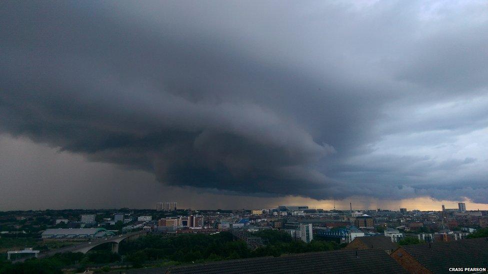 Rain clouds over a city