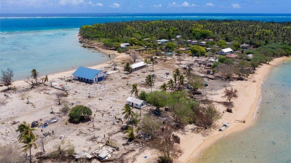 An aerial view taken from a helicopter pilot of homes on Tonga