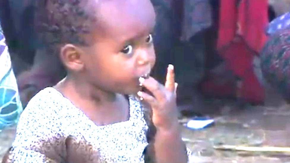 Child eating with her hands