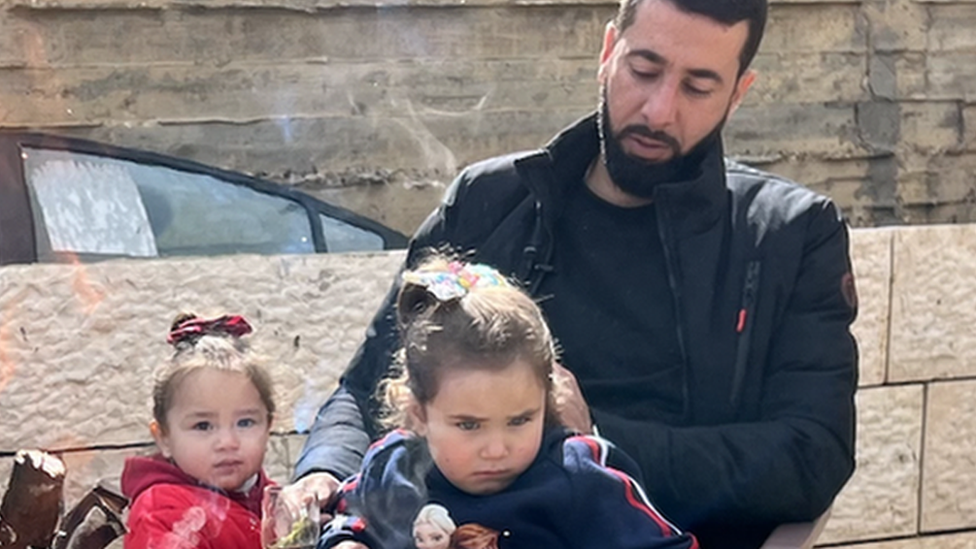 Kamal Karaja with his daughters