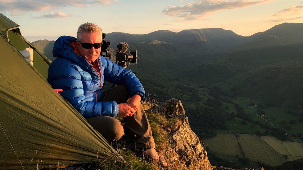 Terry Abraham on a mountainside