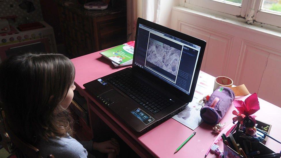 Child looking at computer screen