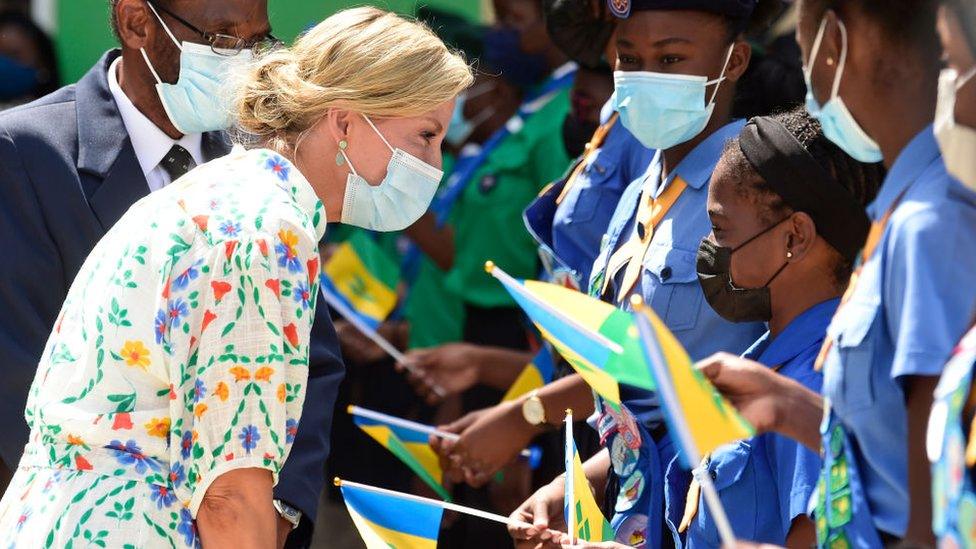 Sophie, Countess of Wessex speaks with girl guides during her arrival at Argyle International Airport