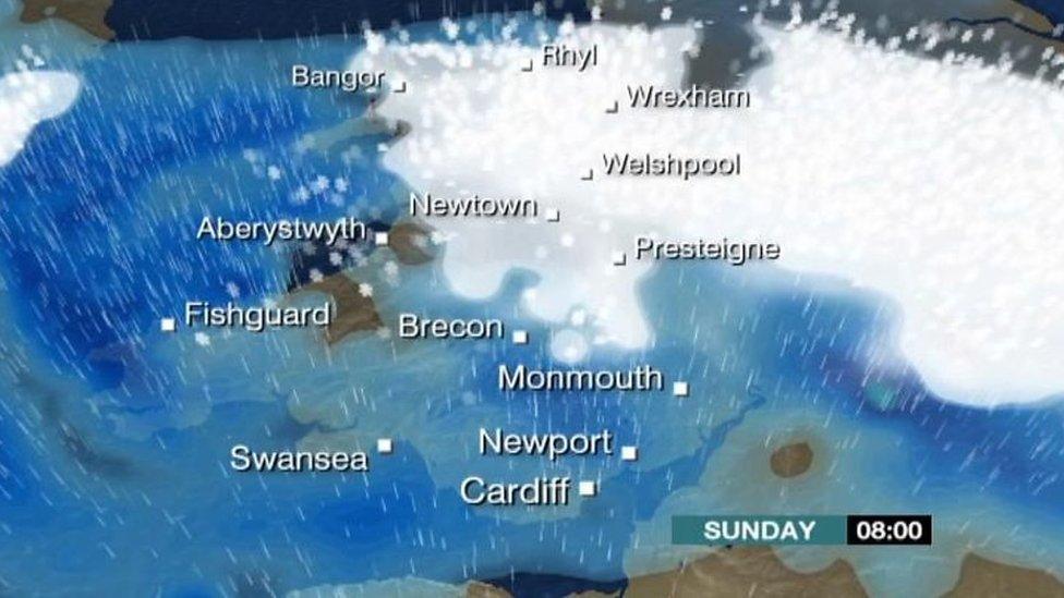 Weather graphic showing snow over north Wales