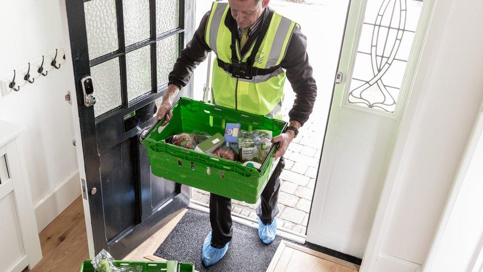 Waitrose delivery man at door