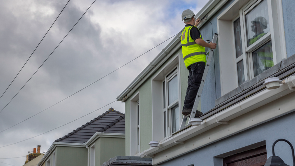 Engineer installing fibre