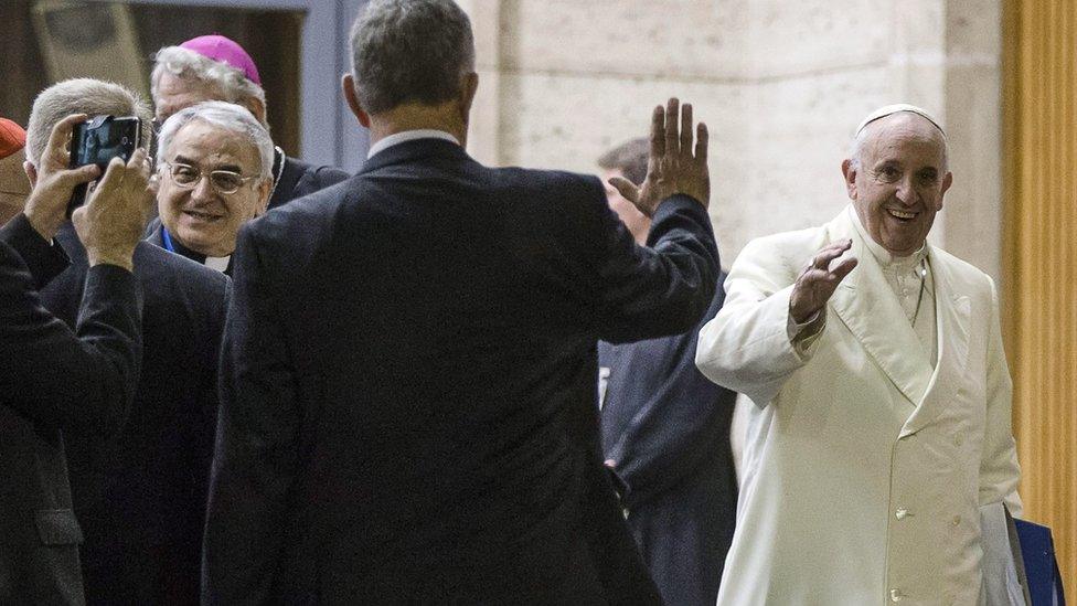 Pope Francis leaves a session of the synod in the Vatican