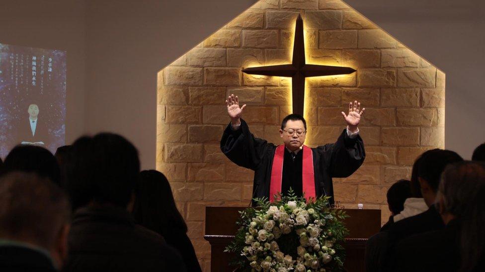 Wang Yi preaching at Early Rain Covenant Church