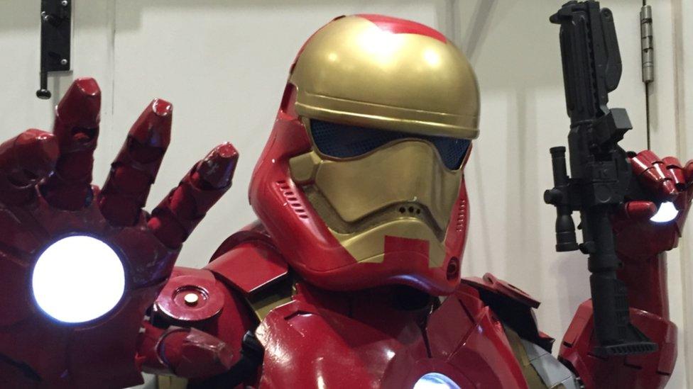 A fan dressed as an Iron Trooper