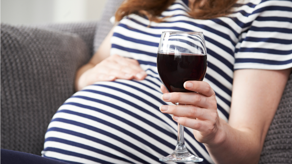 pregnant woman drinking