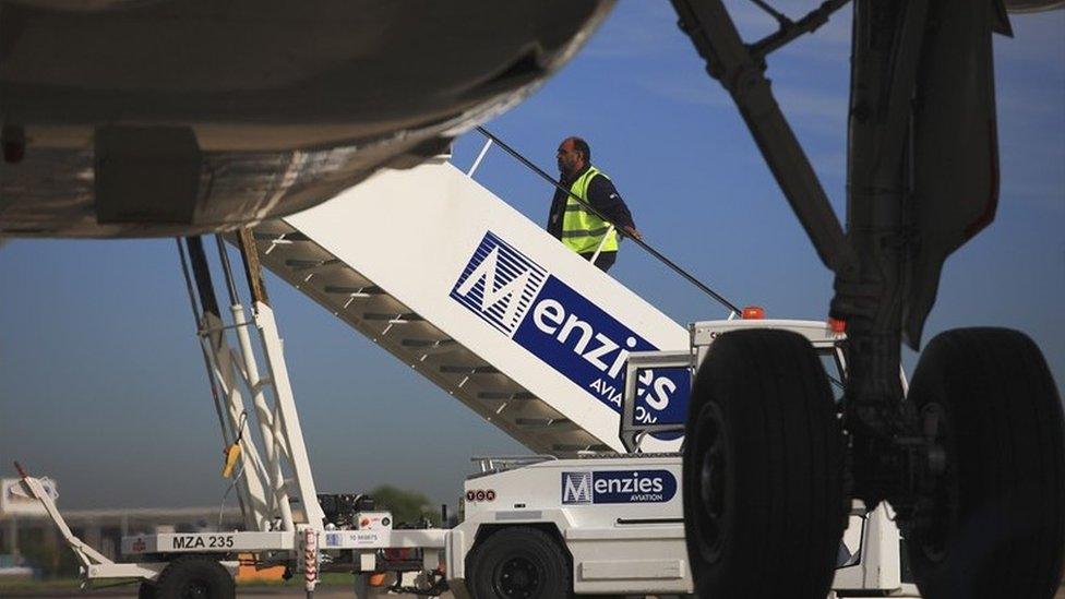 Menzies Aviation staff at airport