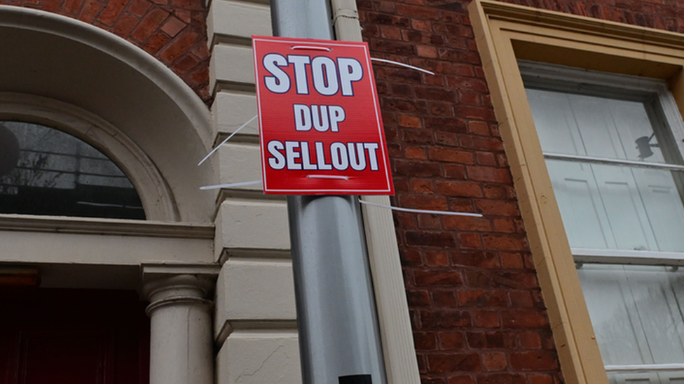 Poster outside the constituency office of Sir Jeffrey Donaldson