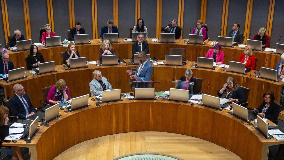 Politicians in the Senedd chamber