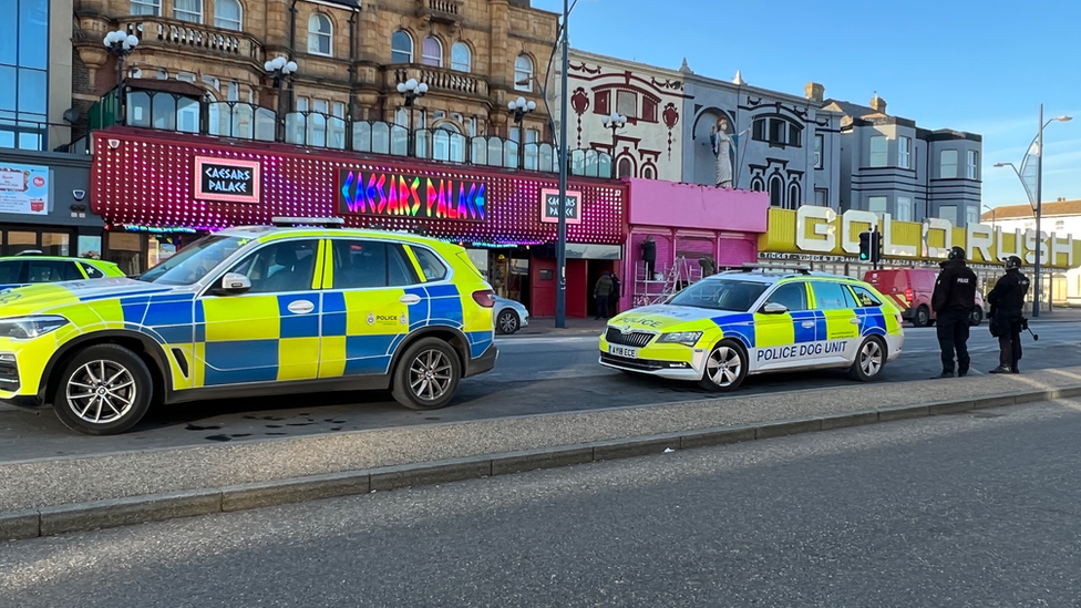 Police cars and armed officers in Great Yarmouth.