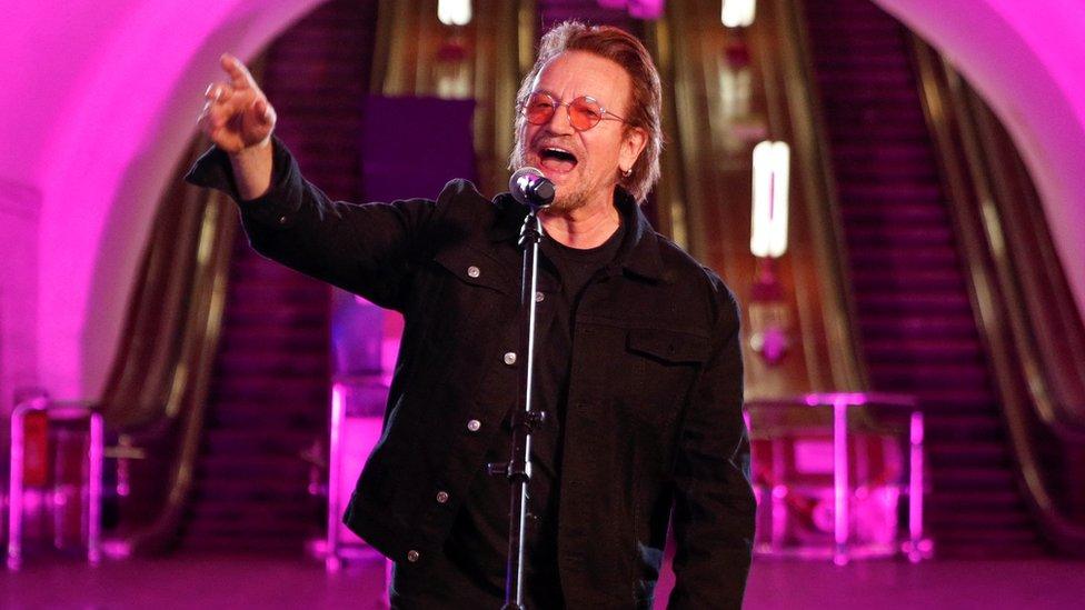 Bono performs in a Kyif subway station