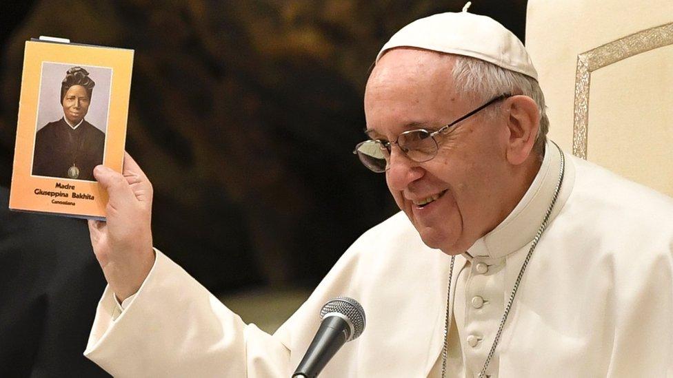 Pope Francis holding up an icon of Sudanese saint Josephine Bakhita during a general audience at the Vatican - Wednesday 8 February 2017