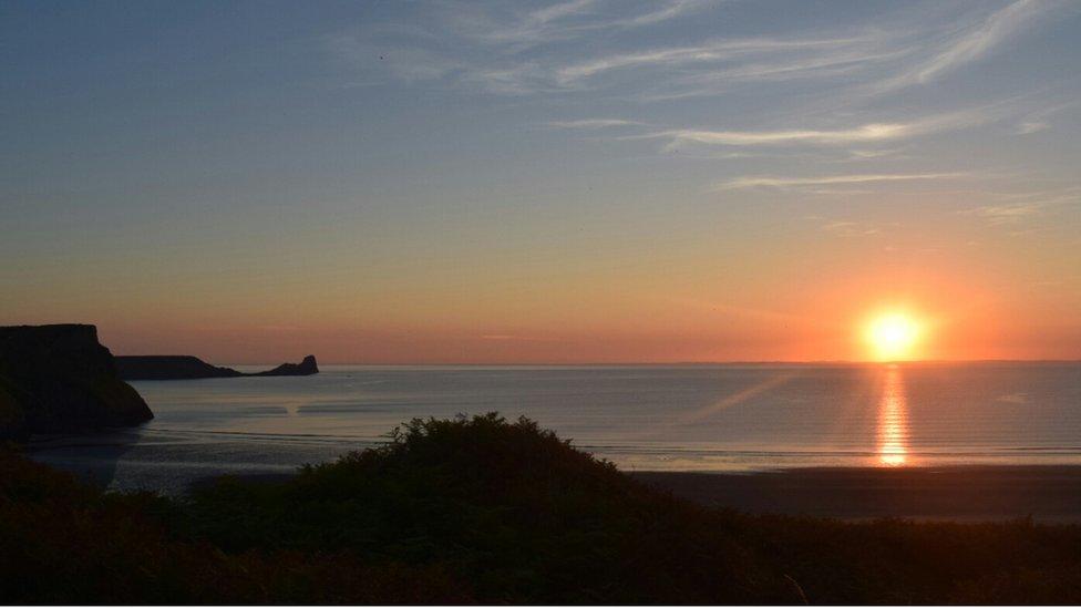 Rhossili Bay in the Gower at sunset, taken by Duane Evans