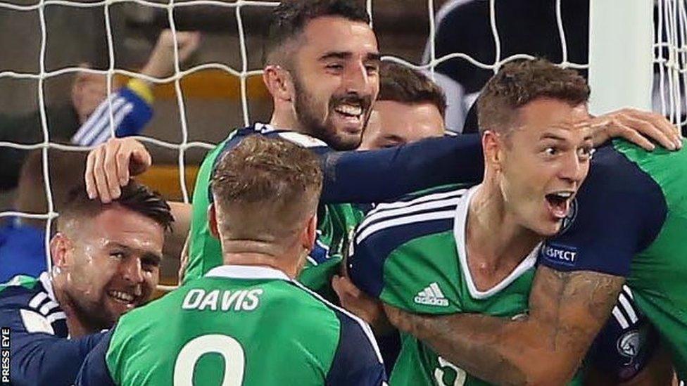 Northern Ireland celebrate Jonny Evans' goal