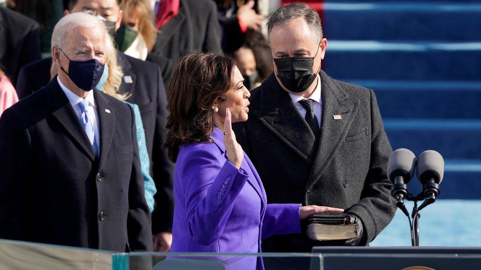 Kamala Harris is sworn in as vice president by Supreme Court Justice Sonia Sotomayor as her husband Doug Emhoff holds the Bible