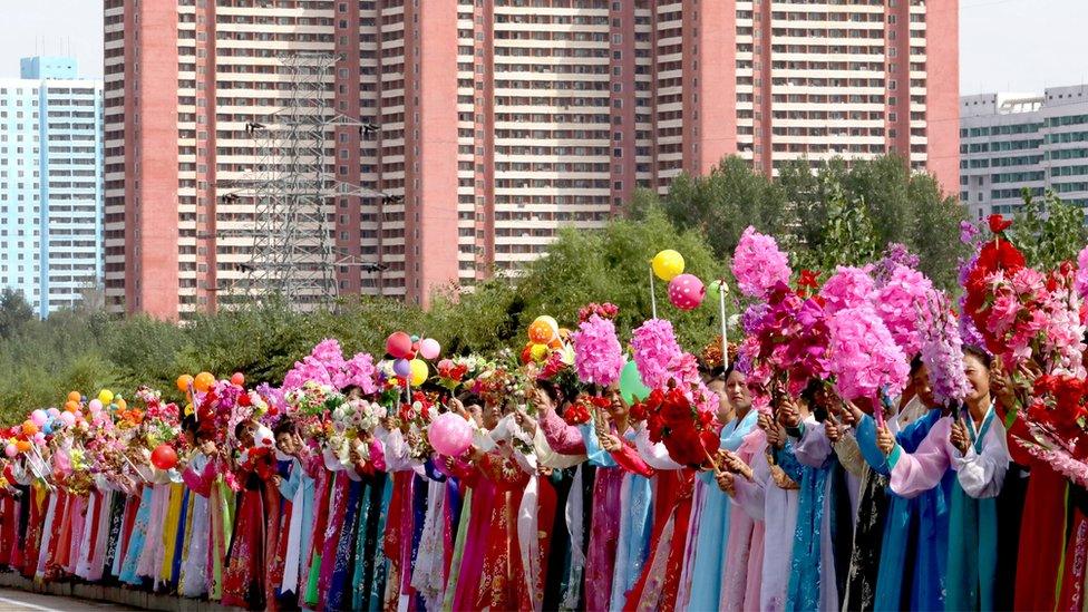 North Koreans cheering