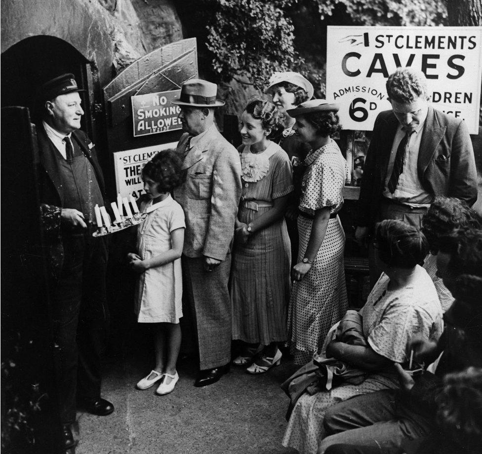 Shelter-seekers would queue up outside their local cave each evening, such as at Hastings, pictured. Many would take candles in for lighting to read or knit by
