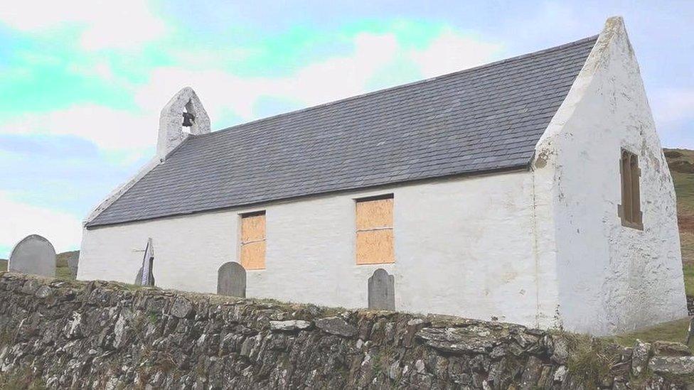 Windows at a church in Ceredigion had to be boarded up after vandals smashed them