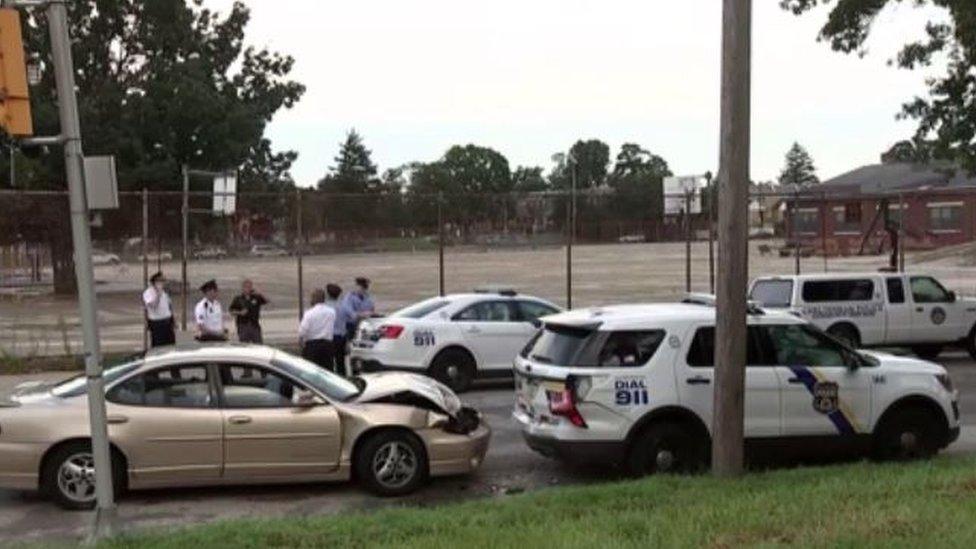 A car is crashed into a police car