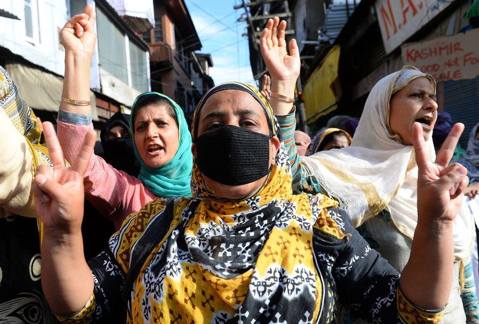 Kashmiri muslims shout anti-India slogans during a protest in Srinagar on August 26, 2016.