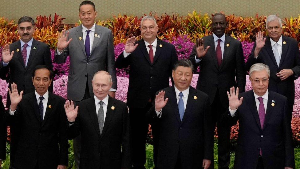 Indonesia's President Joko Widodo, Russia's President Vladimir Putin, China's President Xi Jinping, Kazakhstan's President Kassym-Jomart Tokayev with other leaders wave during a group photo at the third Belt and Road Forum for International Cooperation at the Great Hall of the People in Beijing on October 18, 2023.