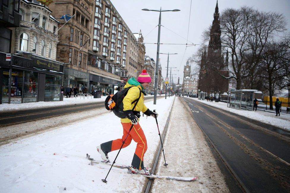 A person skis along Princes Street in Edinburgh