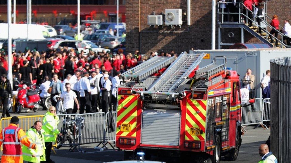 A fire engine heads towards the stadium on Sunday