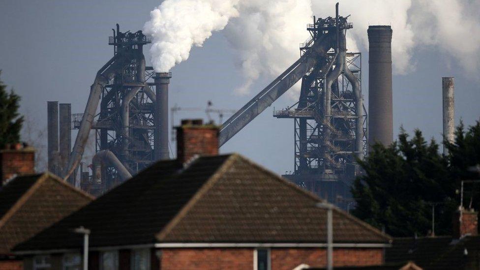 Vapour rising from chimneys at the Scunthorpe steelworks