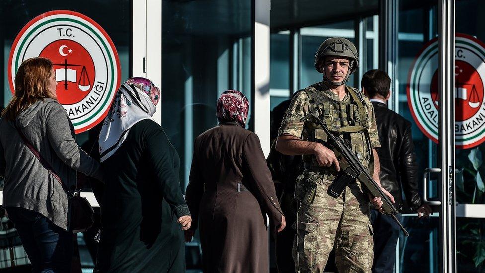 Relatives of civilians killed on bridge and soldier at courthouse entrance, 9 Oct 17