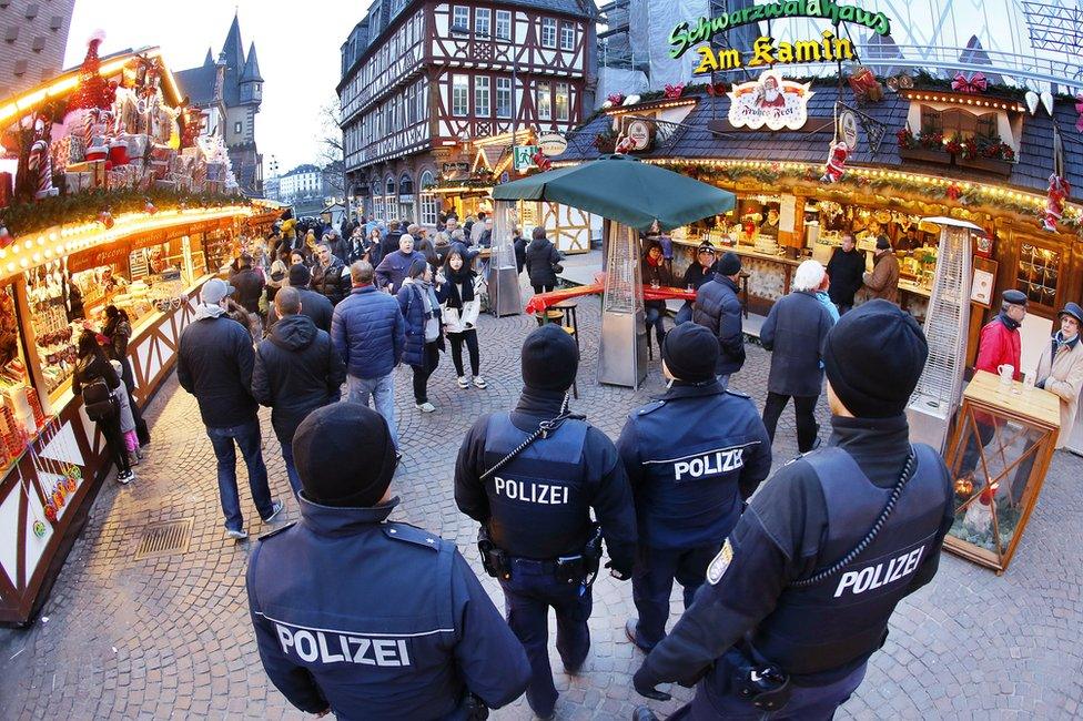 German police officers patrol the Christmas market in Frankfurt, 20 December