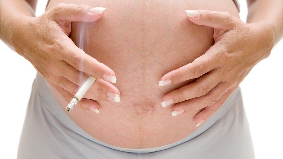 Pregnant woman smoking