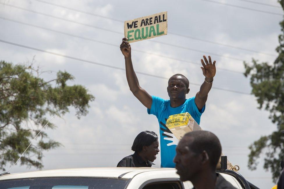 Dickson Juma marches in a deaf awareness march in Kapsabet, Kenya