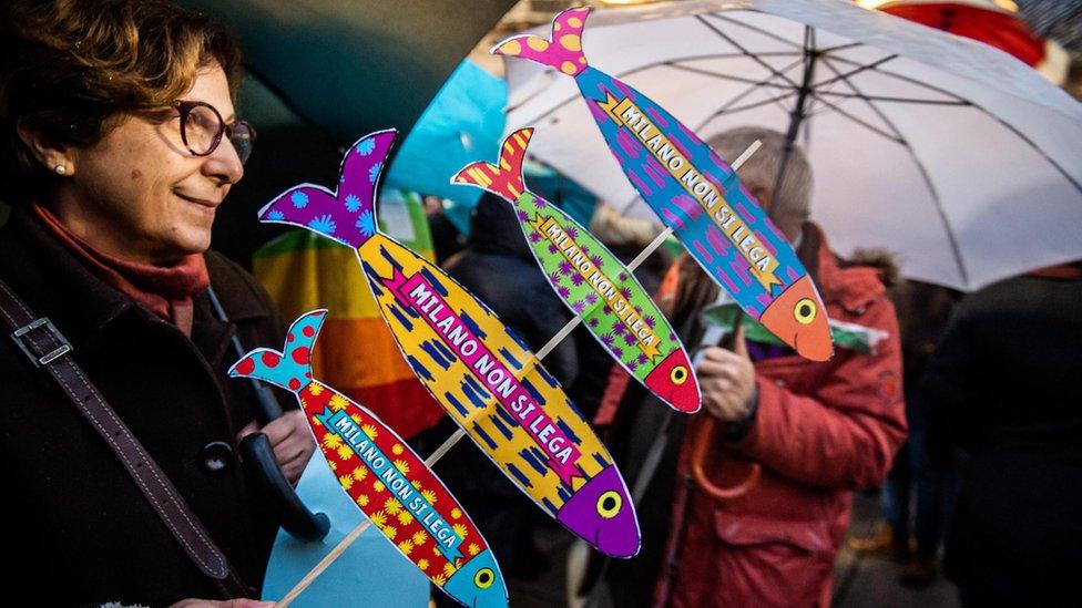 People attend a rally staged by the anti-Salvini "Sardines" movement in Duomo Square, Milan, 1 December 2019