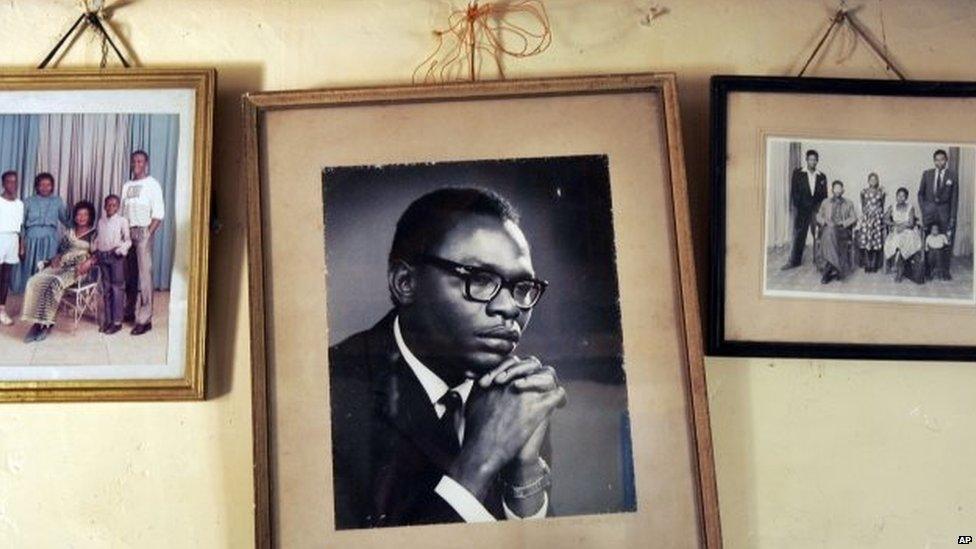 Framed photo of the father of President Barack Obama hangs on the wall of his step-grandmother in the village of Kogelo - July 2015