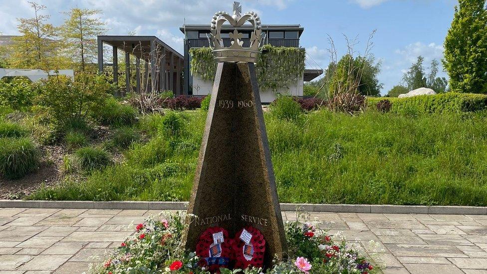 Stone and floral tribute